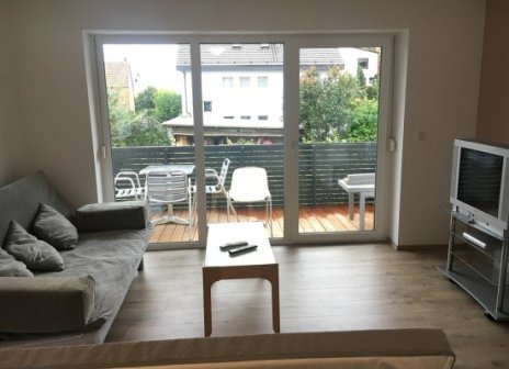 Wohnung mit Wohnzimmer und TV sowie WLAN