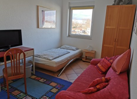 Wohn- und Schlafzimmer