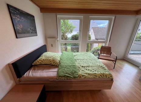 Gästezimmer mit Balkon